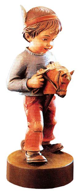 Bebé de madera con traje indio