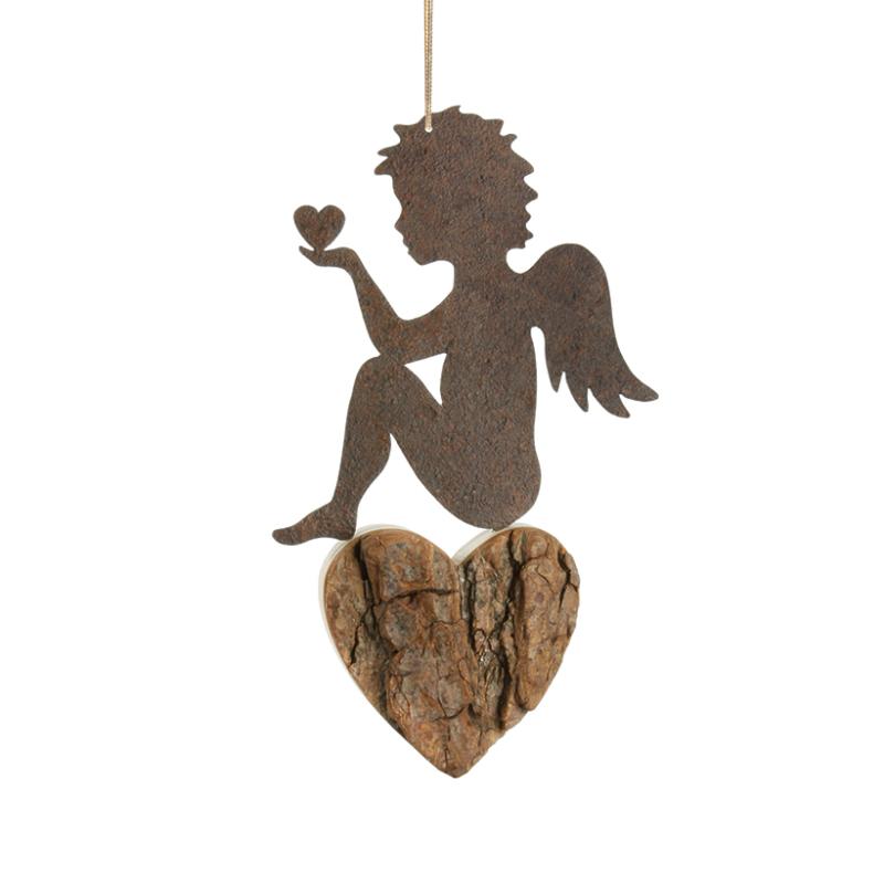 Iron Angel sitting on Heart Ornament