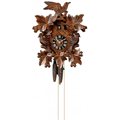 Cuckoo clock with carved cuckoo in walnut wood