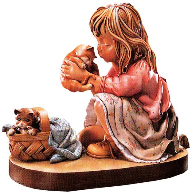 Chatons avec figurine en bois