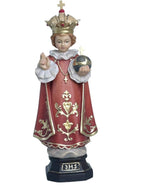 Enfant Jésus de Prague sculpté en bois avec monde