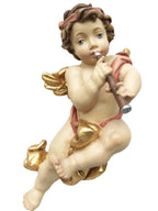 Ange musicien volant avec clarinette en bois