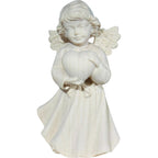 Ange sculpté en bois avec cœur
