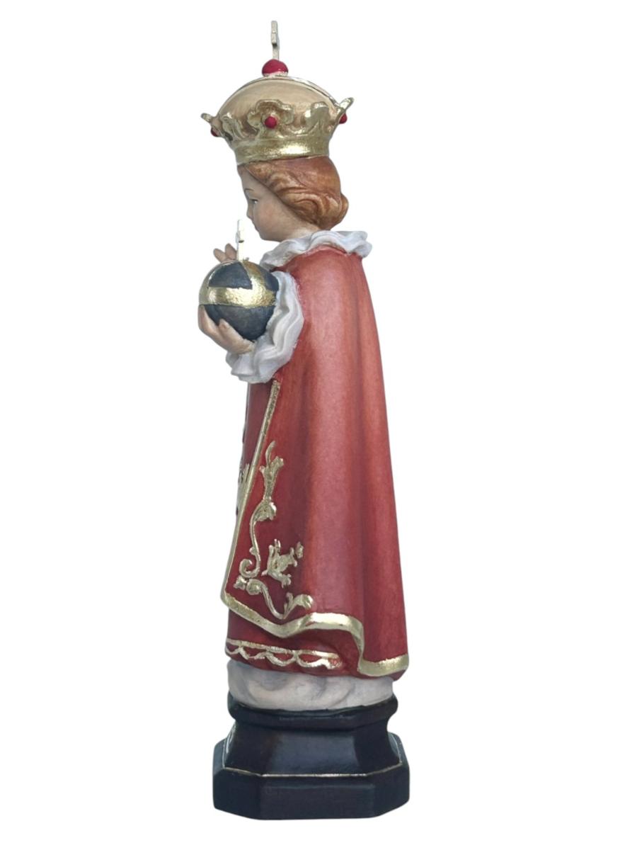 Enfant Jésus de Prague sculpté en bois avec monde