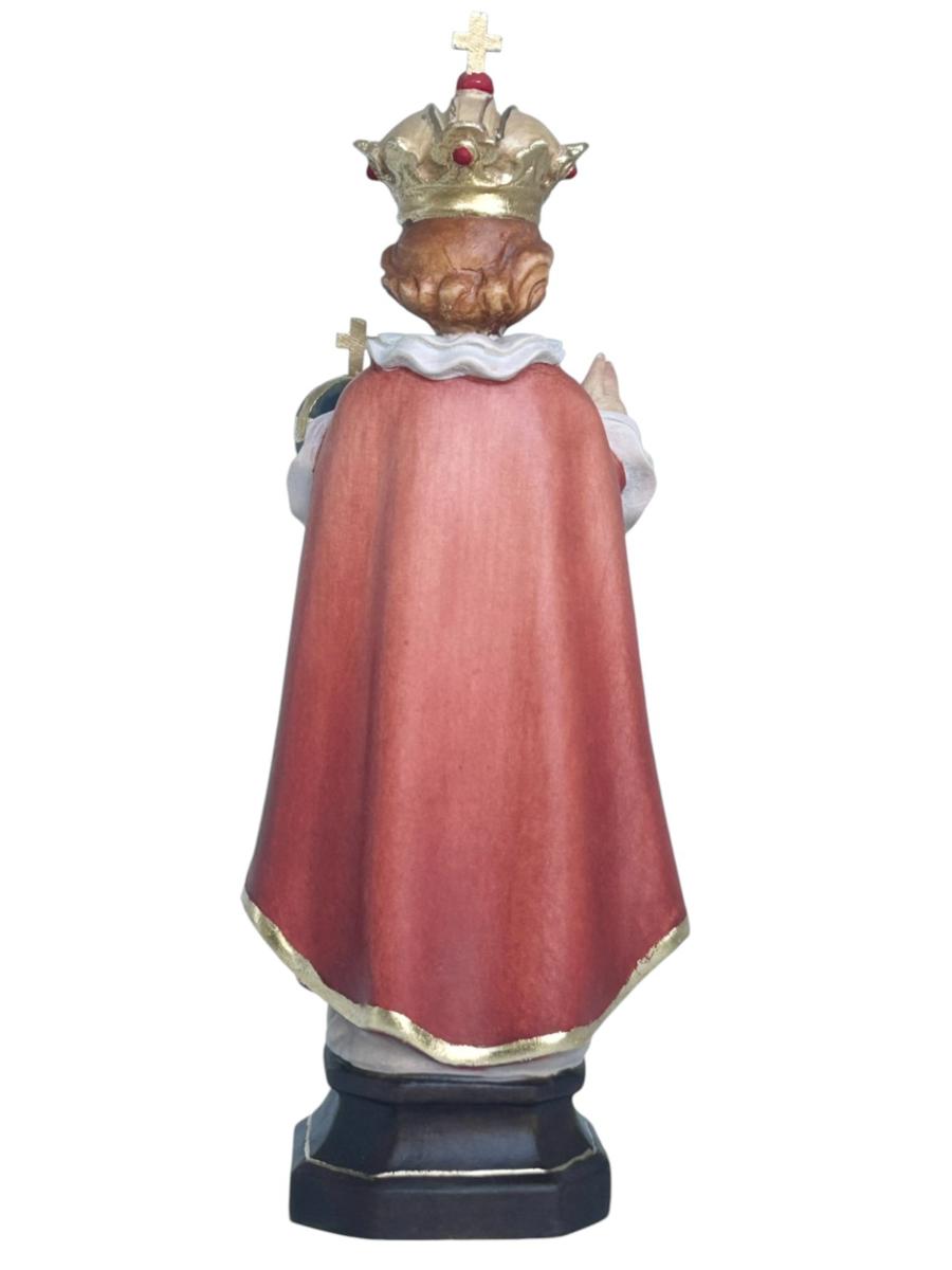 Enfant Jésus de Prague sculpté en bois avec monde