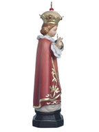 Enfant Jésus de Prague sculpté en bois avec monde