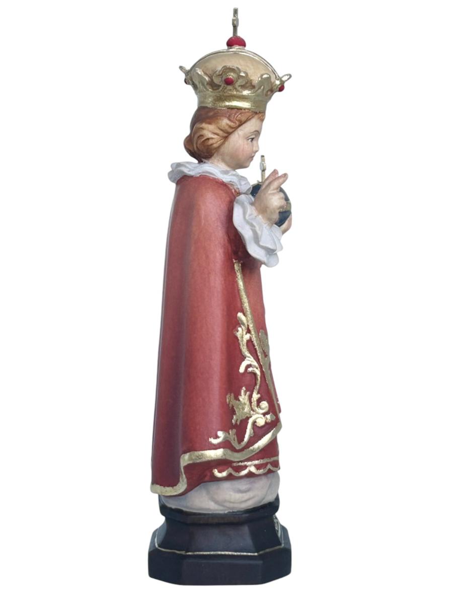 Enfant Jésus de Prague sculpté en bois avec monde