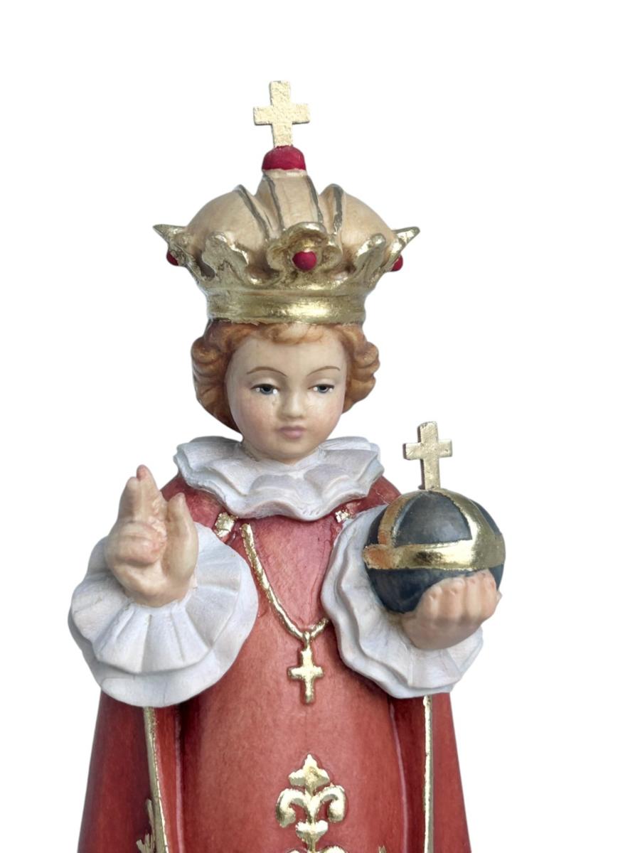Enfant Jésus de Prague sculpté en bois avec monde