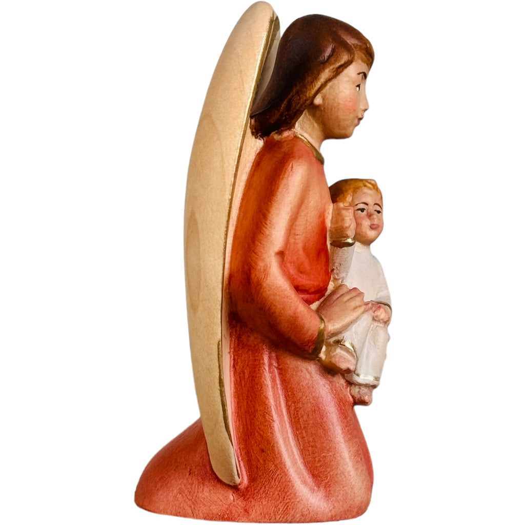 Ange gardien avec enfant en bois