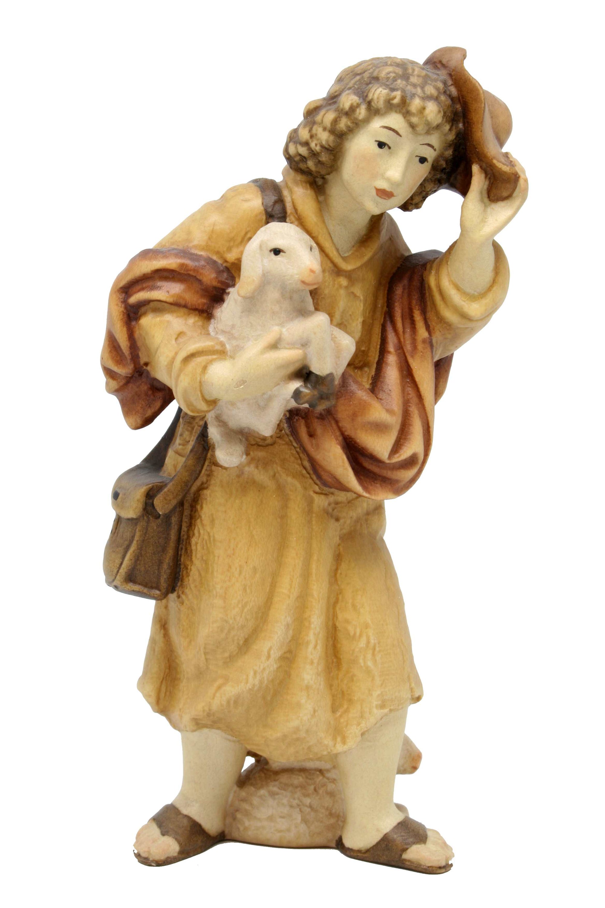 Berger avec chapeau et mouton