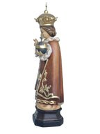 Enfant Jésus de Prague sculpté en bois avec monde