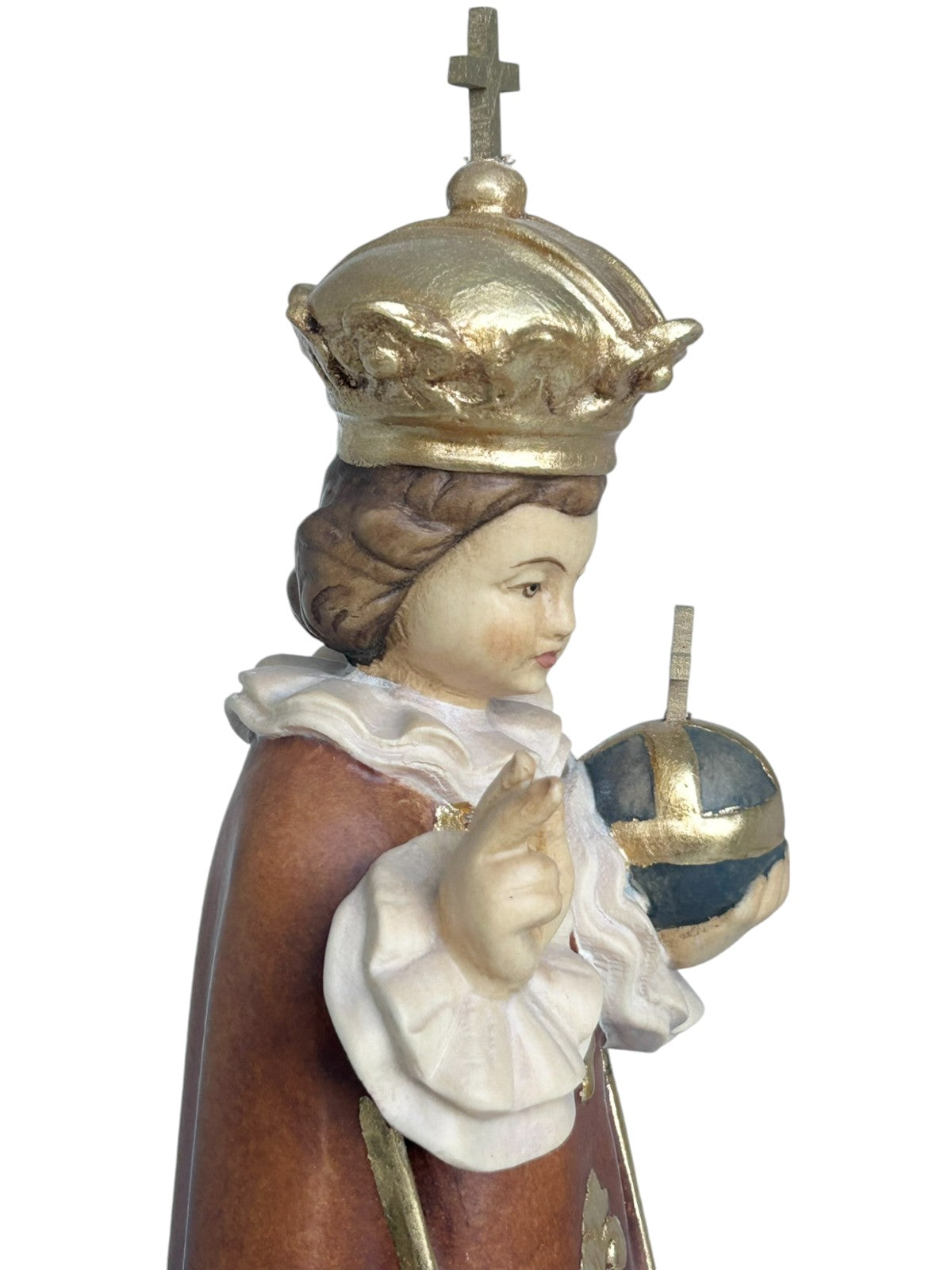 Enfant Jésus de Prague sculpté en bois avec monde