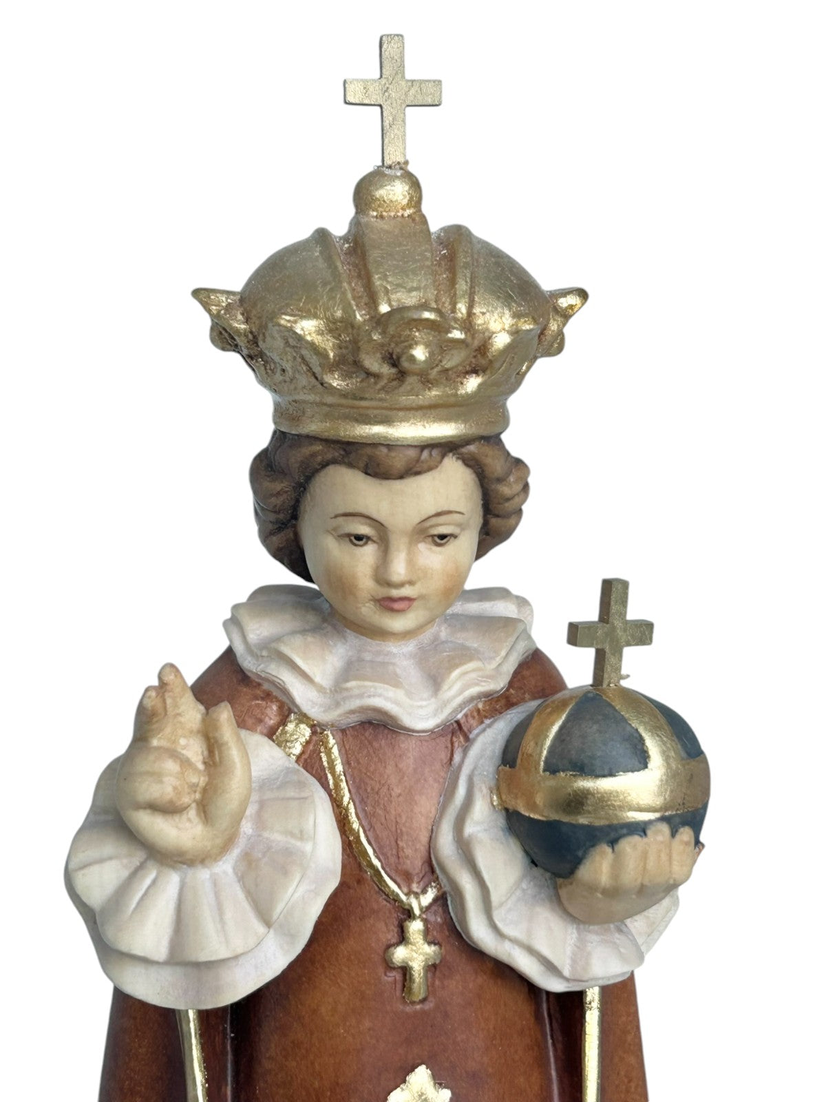 Enfant Jésus de Prague sculpté en bois avec monde