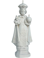 Enfant Jésus de Prague sculpté en bois avec monde