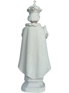 Enfant Jésus de Prague sculpté en bois avec monde