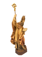 Saint Alphonse avec un livre sculpté en bois