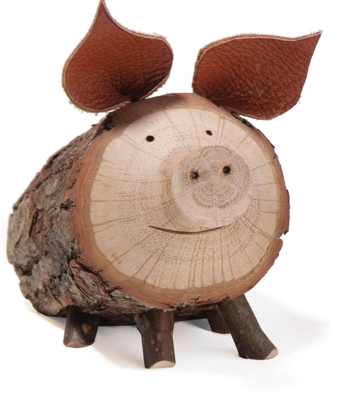 Petit cochon en bois sculpté