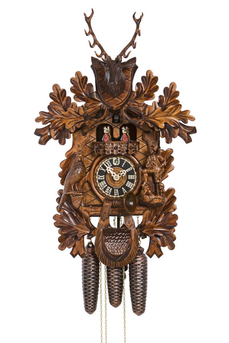 Horloge décorative avec coucou sculpté