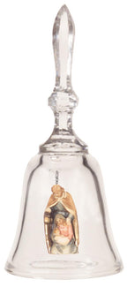 Cloche en cristal avec une crèche en bois