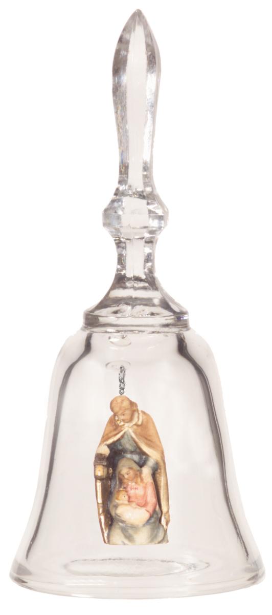 Cloche en cristal avec une crèche en bois