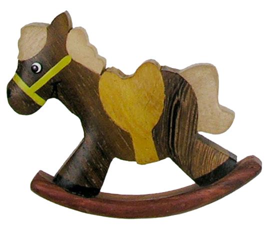 Le cheval à bascule aimanté