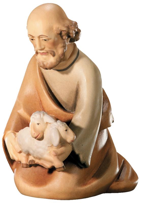 Figurine en bois de berger agenouillé