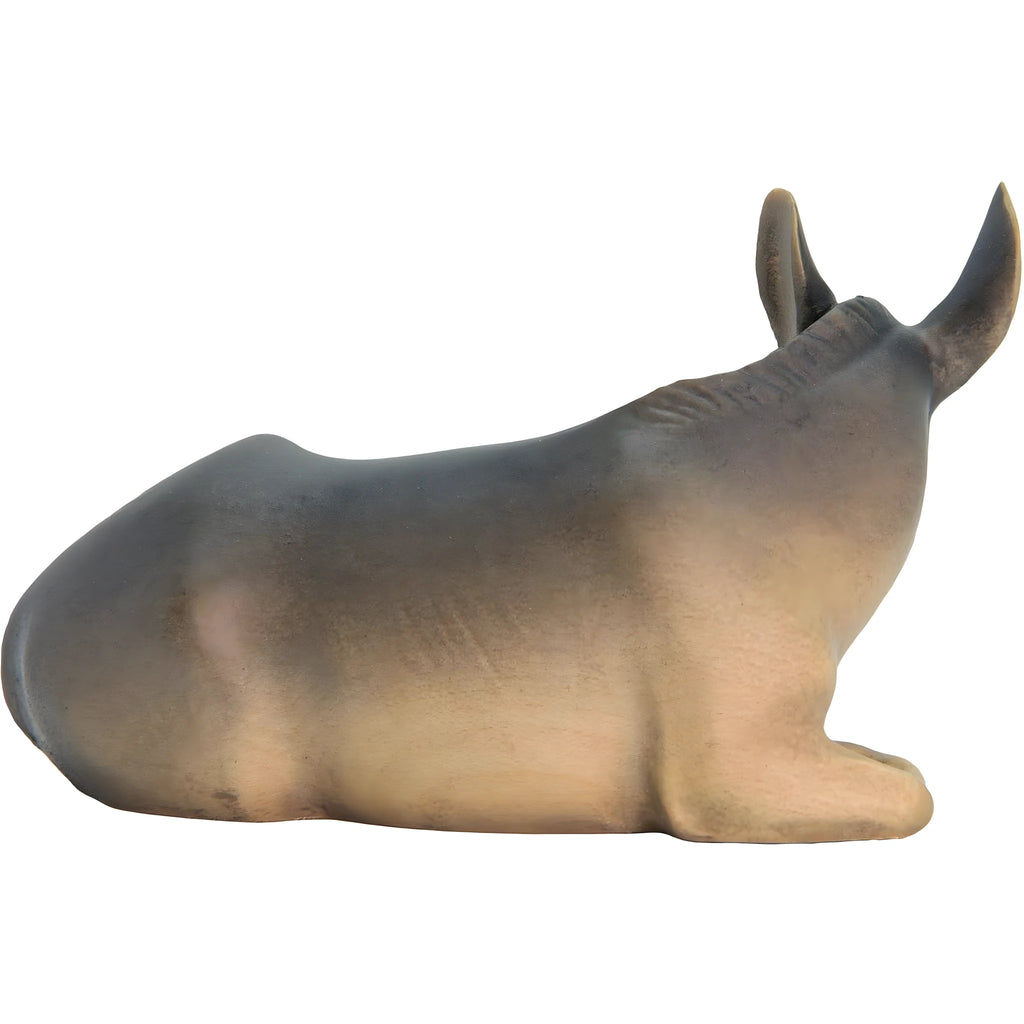 Lying donkey for artisanal wooden nativity scene sculpted in Val Gardena