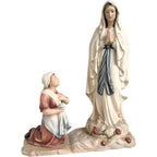 Rzeźbiona figurka Matki Bożej z Lourdes z Bernadettą z drewna z Val Gardena
