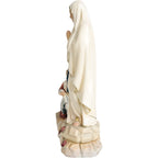 Rzeźbiona figurka Matki Bożej z Lourdes z Bernadettą z drewna z Val Gardena